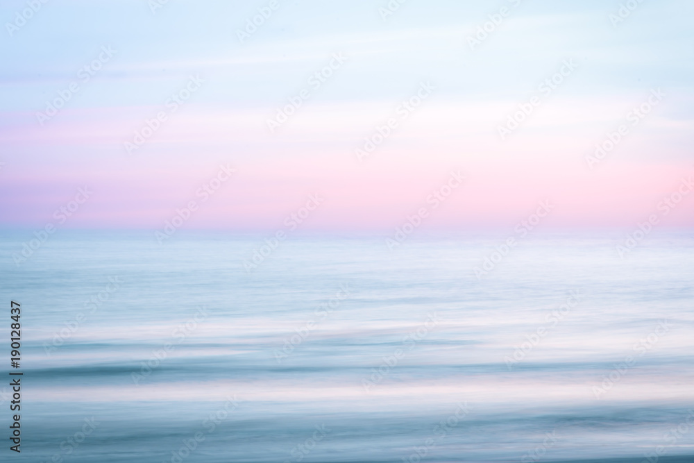 Fototapeta premium Abstrakcjonistyczny wschodu słońca nieba i oceanu natury tło
