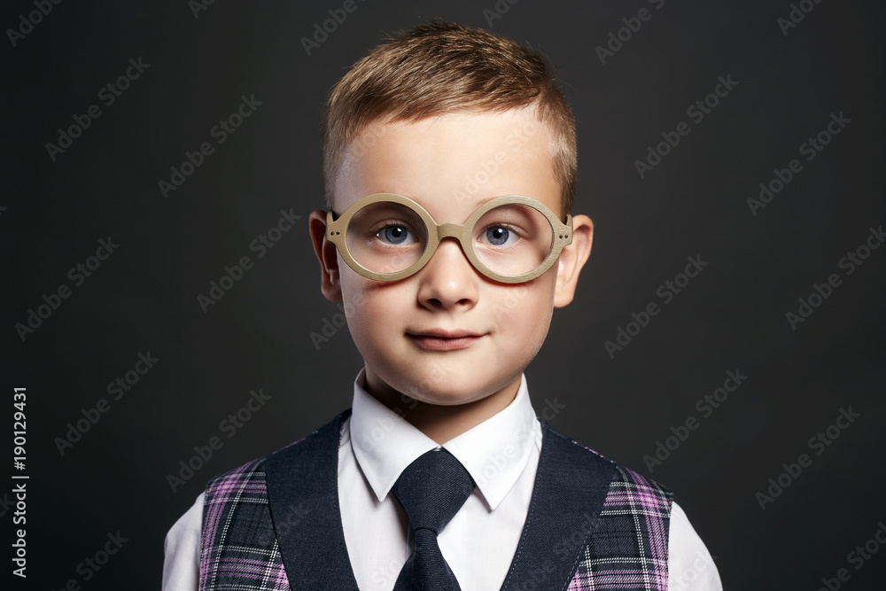 funny little boy in suit and glasses funny little boy in suit and glasses