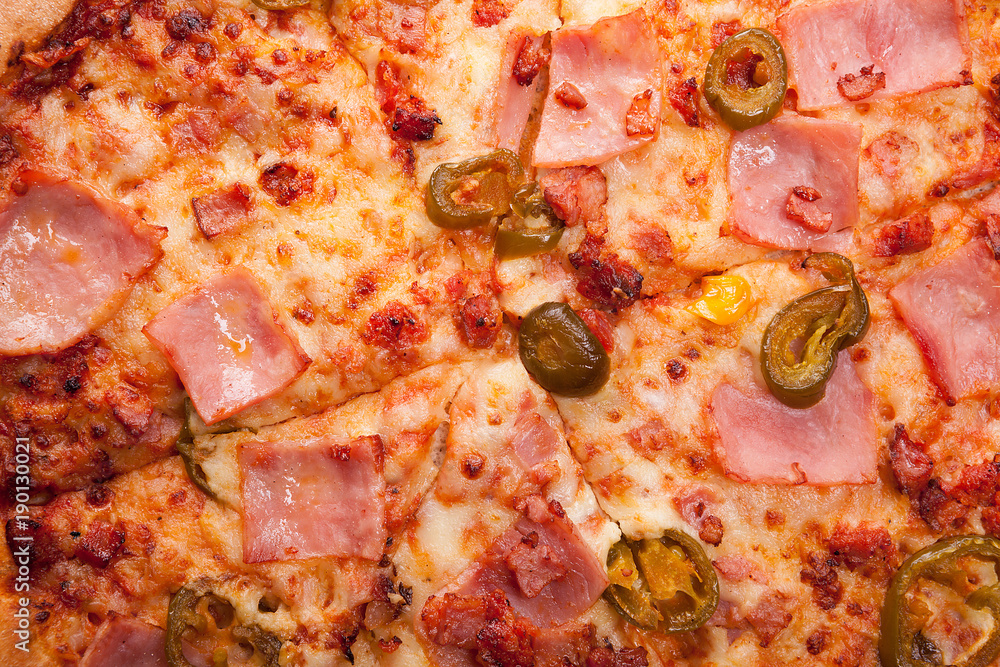 Close up on hot fresh pizza with jalapeno Close up on hot fresh pizza with jalapeno