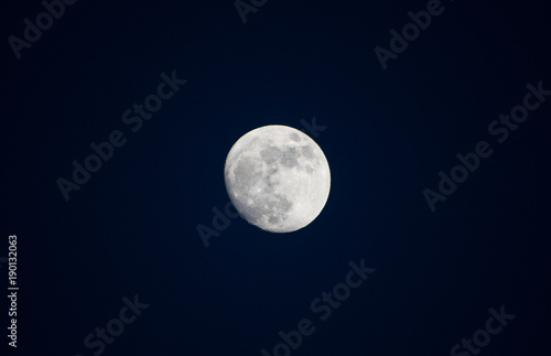 Blue moon on the dark blue sky