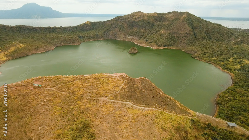 Aerial view Lake crater at Taal Volcano on Luzon Island North of Manila in Philippines. Volcano with a crater on an island in the middle of a lake. Luzon, Philippines. Travel concept.