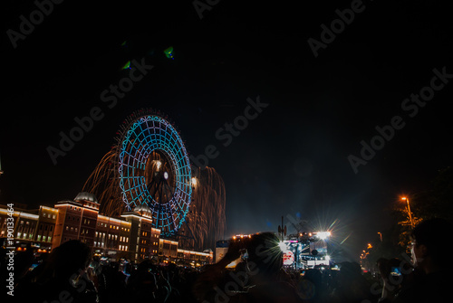 ferris wheel with fireworks for New Year Celebration