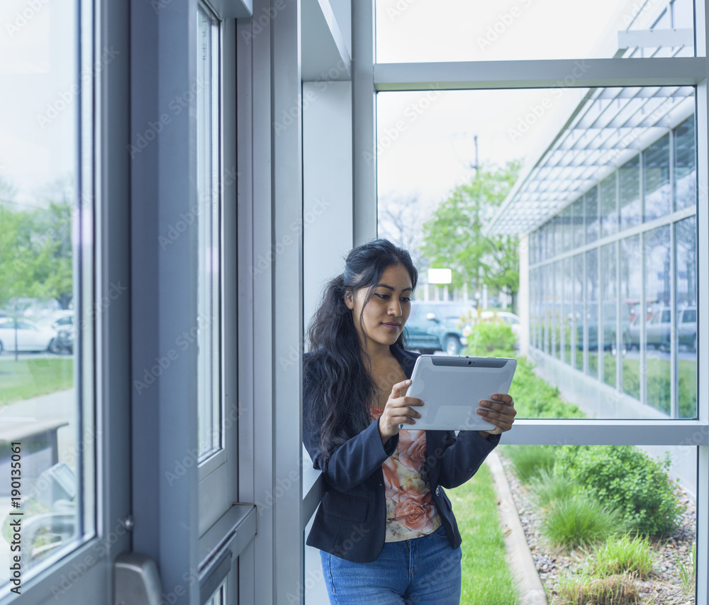 Smiling student inside college