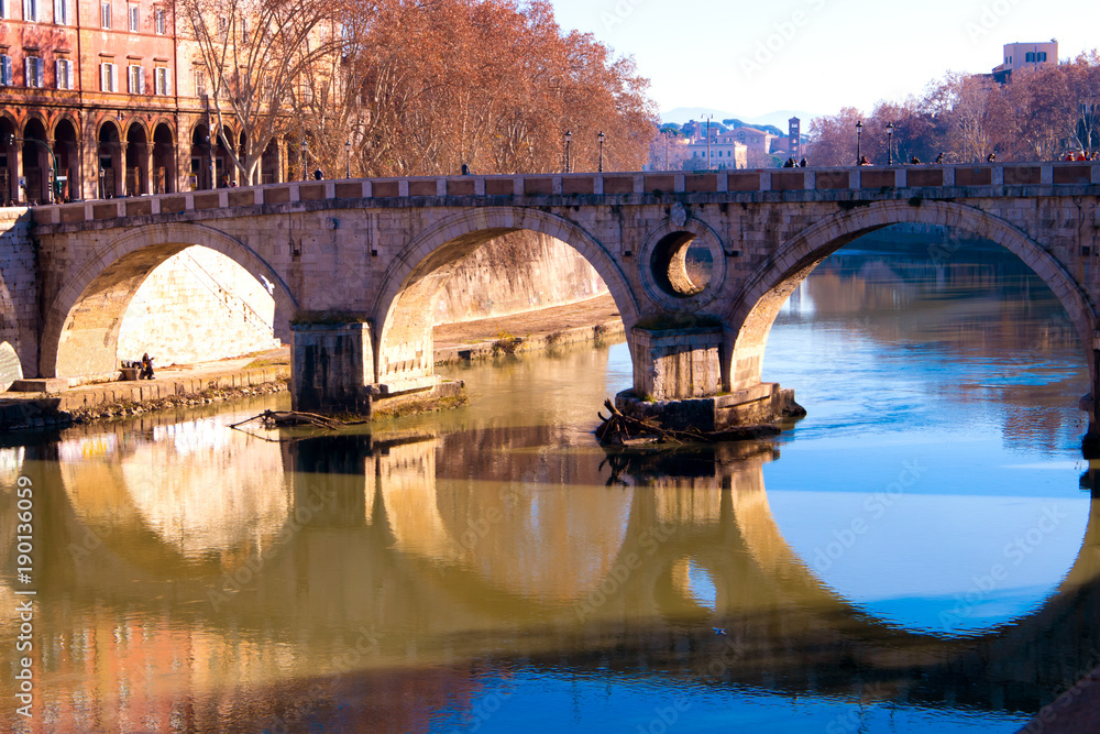 Fototapeta premium Ponte-sisto bridge over the Tiber River, located in the historic center of Rome in Italy.