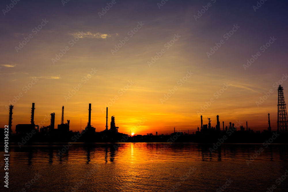 oil refineries and evening light.
