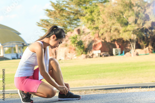 A women is  exercising and relaxing at the park. © Cheangchai