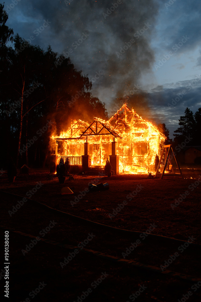 Fototapeta premium The house is on fire