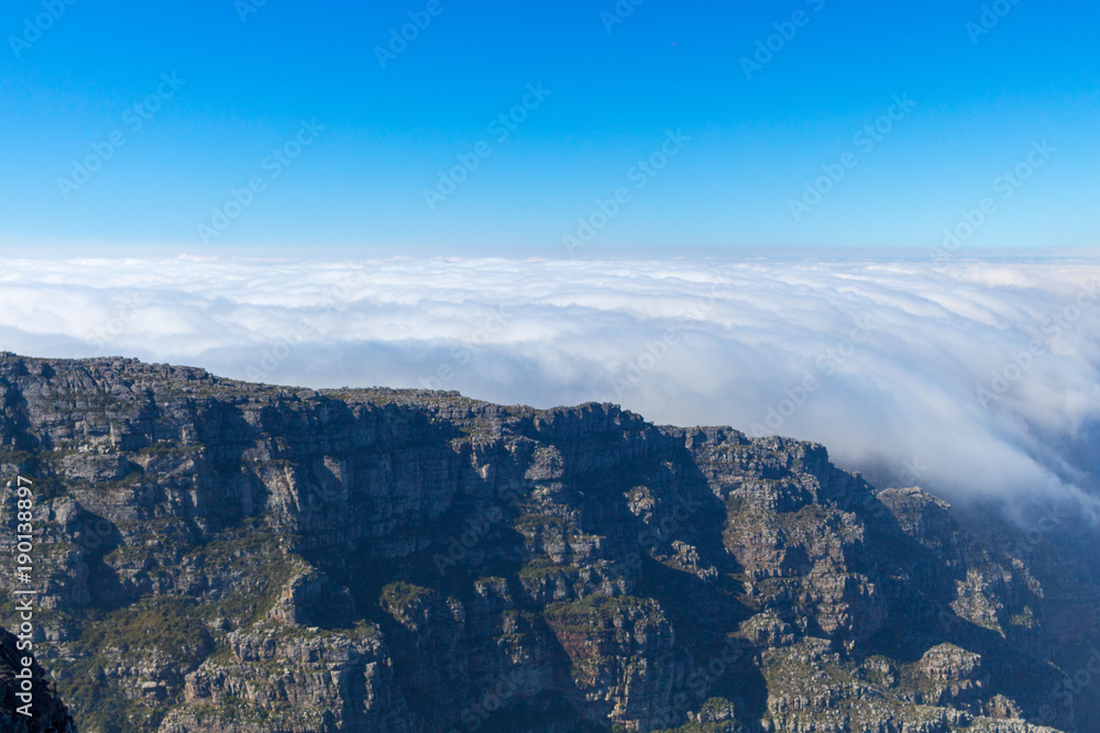 Fototapeta premium Clouds behind the mountain