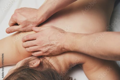 Massage procedures on shoulders, back and cervical department