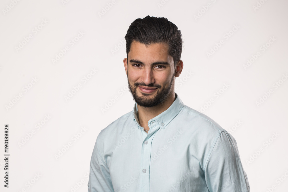 Portrait of young attractive man smiling Portrait of young attractive man smiling