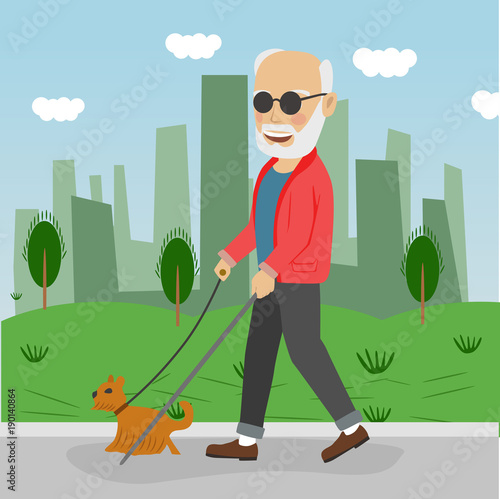 Senior blind man with guide dog walking outdoor in city park