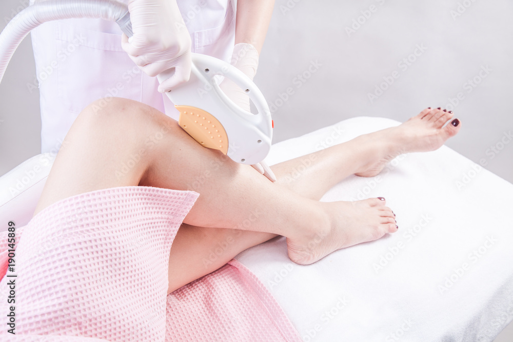 Laser epilation and cosmetology. Hair removal cosmetology procedure. Laser epilation and cosmetology. Cosmetology and SPA concept. Laser epilation and cosmetology. Hair removal cosmetology procedure. Laser epilation and cosmetology. Cosmetology and SPA concept.