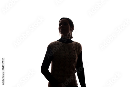 Young woman looking up - horizontal silhouette