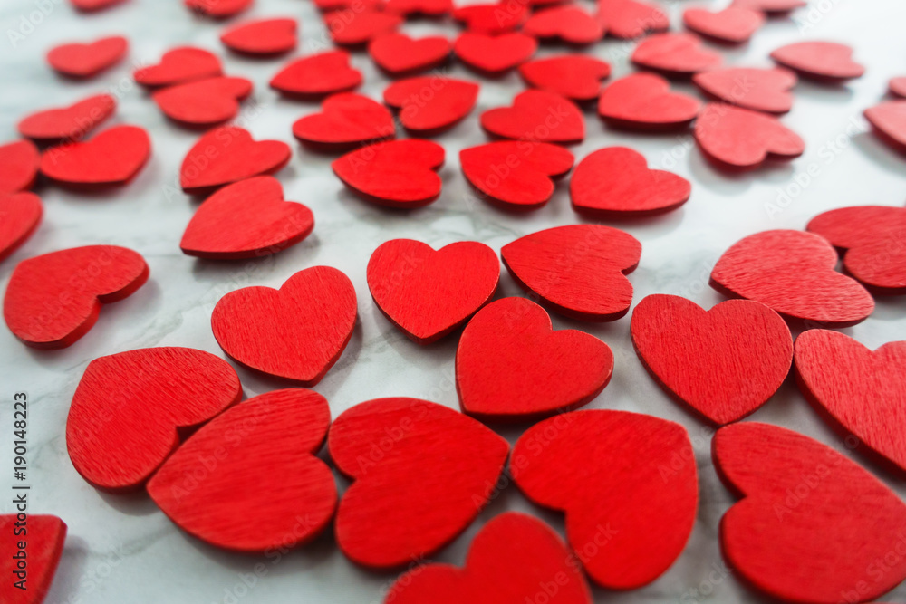 Valentines Day background with red hearts on white surface. Romantic seamless pattern for holiday, flat laz, top view Valentines Day background with red hearts on white surface. Romantic seamless pattern for holiday, flat laz, top view