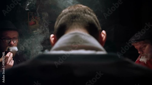 Dangerous poker players sitting around a table