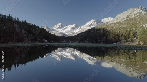 Aerial Snow Mountain Valley with Mirror Lake reflection - Inyo National Forest, Little Lakes Valley Trail (Gem Lakes), Bishop, California