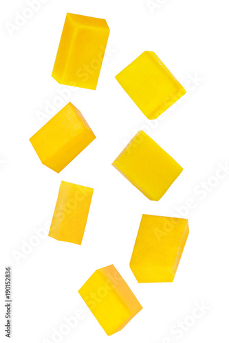 Falling sliced mango isolated on white