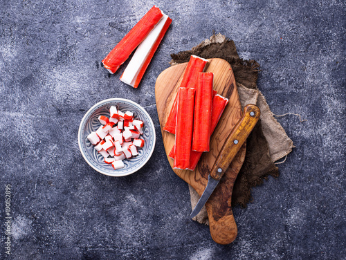 Photography Crab sticks surimi and knife