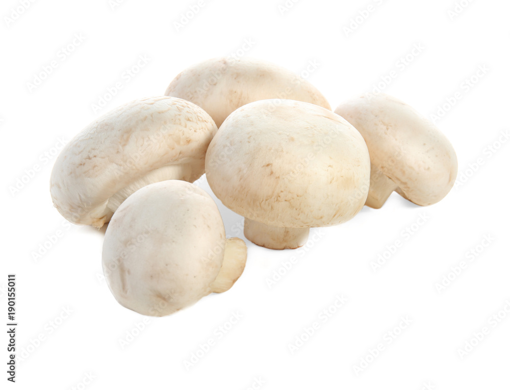 Raw champignon mushrooms on white background Raw champignon mushrooms on white background