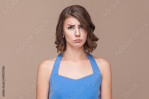 Unhappy business woman looking at camera and cry.