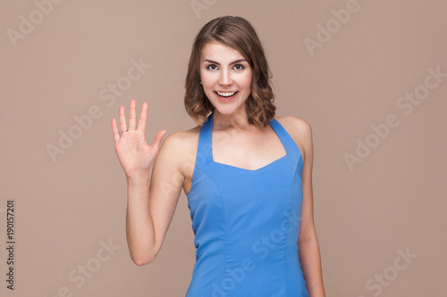 Wallpaper Mural Well hi! Business woman showing hello sign at camera. Torontodigital.ca