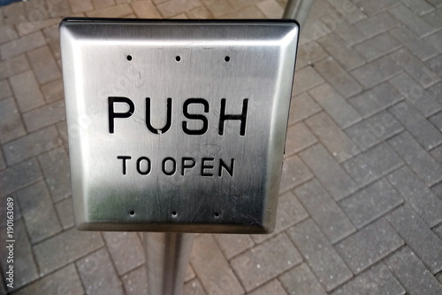 Obraz na plátne Push button to allow wheelchair users to open an automatic door