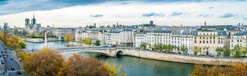Panorama of Notre-dame-de-Paris and Seine river in autumn