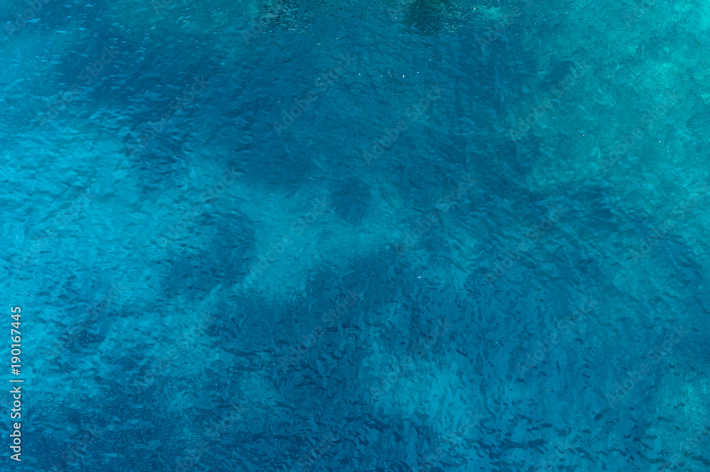 Aerial view on turquoise waves, water surface texture Aerial view on turquoise waves, water surface texture