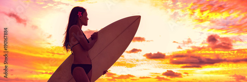 Photography Surfer bikini girl on Hawaii beach holding surf board watching ocean waves at sunset