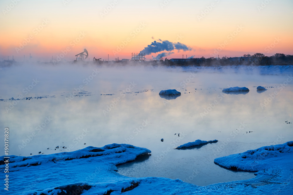 The winter lake sunrise landscape.