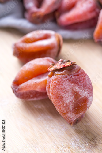 Closeup of dried persimmon on table