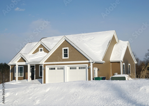 Close up on residential house after snow in winter