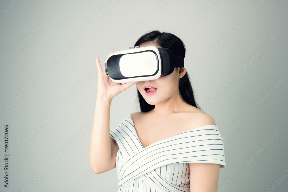 woman wore a virtual reality headset that simulates, the reality and looked up to see what the virtual reality was capable of rendering. woman wore a virtual reality headset that simulates, the reality and looked up to see what the virtual reality was capable of rendering.