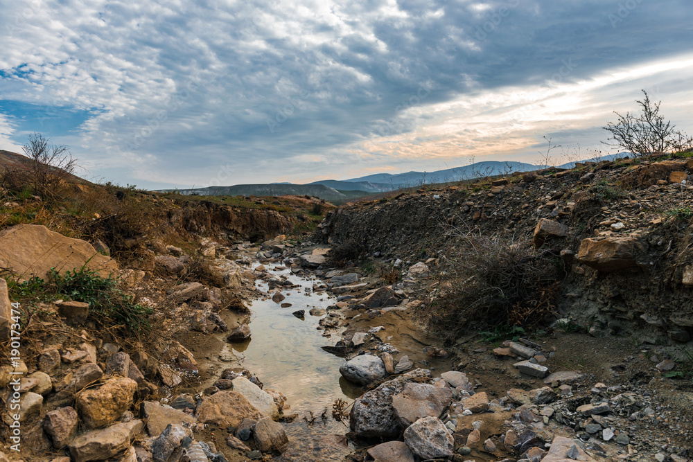 Fototapeta premium Stream of mountain river