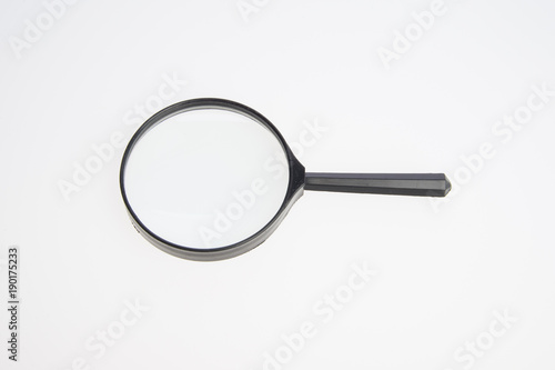 Magnifying Glass or Magnify on a background.