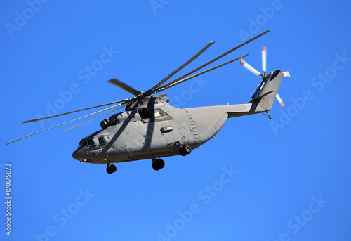 Transport helicopter in blue sky
