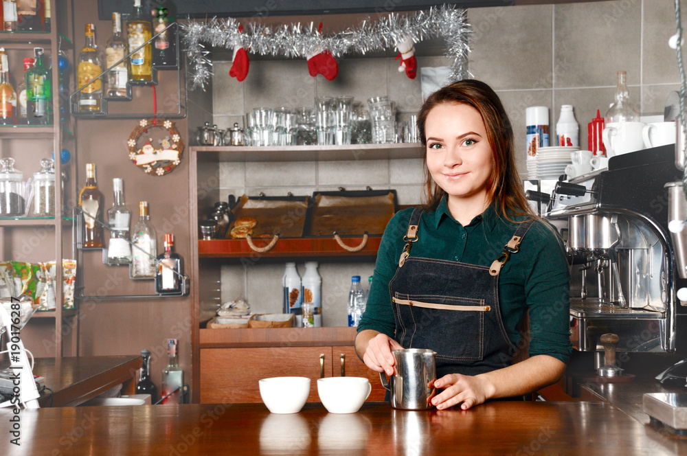 Barista woman at workplace in coffee shop