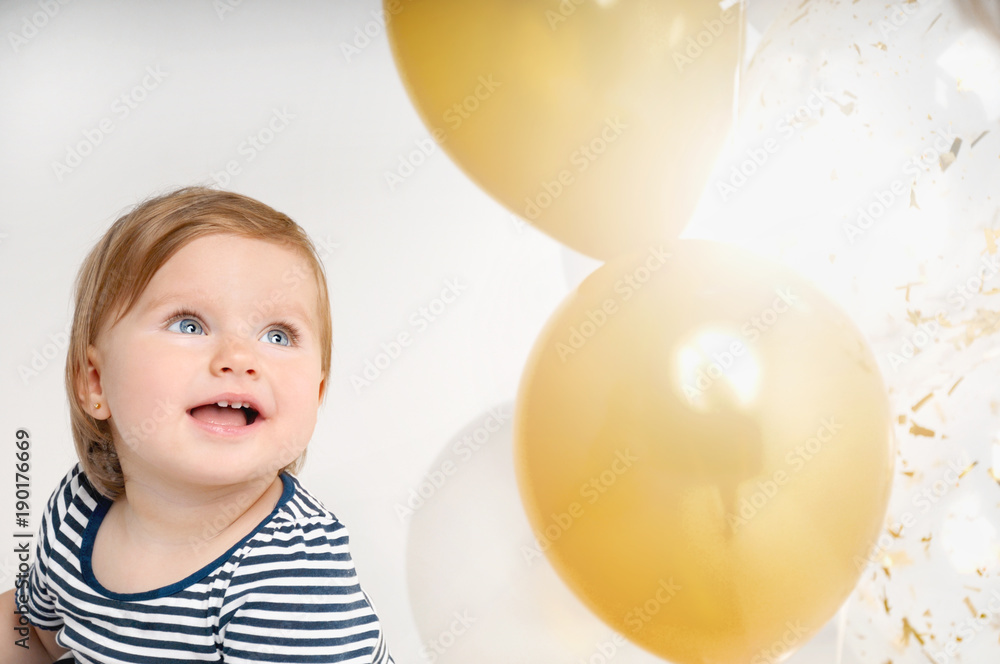 Portrait of happy little baby girl smiling on the day of birth Portrait of happy little baby girl smiling on the day of birth