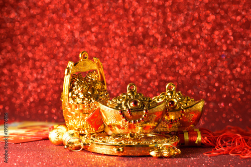 Chinese new year decorations and Auspicious ornaments on red bokeh background.