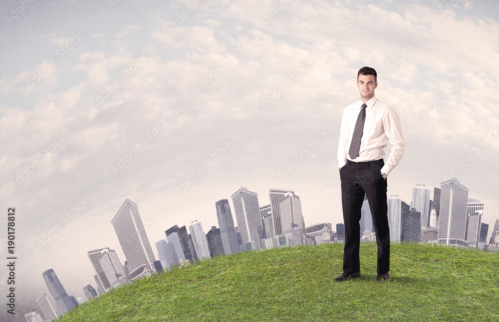 man standing in front of city landscape man standing in front of city landscape