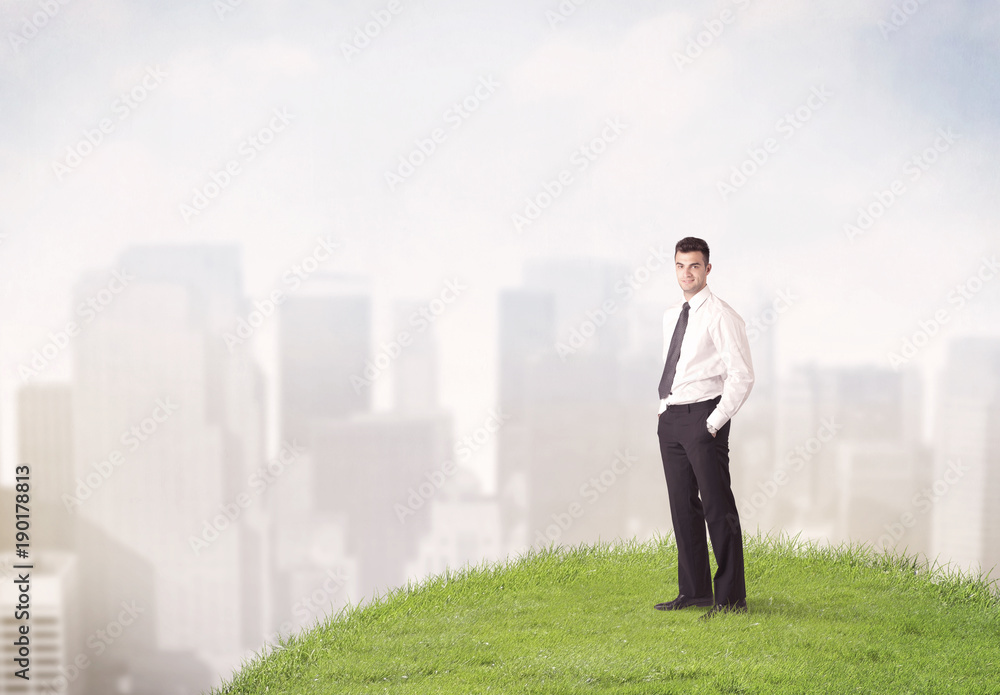 man standing in front of city landscape man standing in front of city landscape