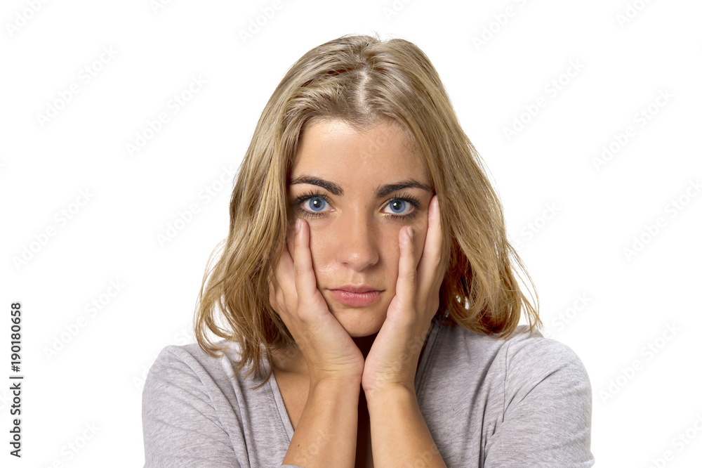 head portrait of young beautiful and sweet blond girl with blue eyes looking sad and depressed, shy and worried in sadness emotion head portrait of young beautiful and sweet blond girl with blue eyes looking sad and depressed, shy and worried in sadness emotion