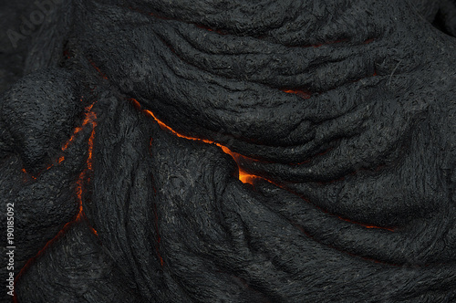 Molten Lava rocks with texture and extreme heat in  photo