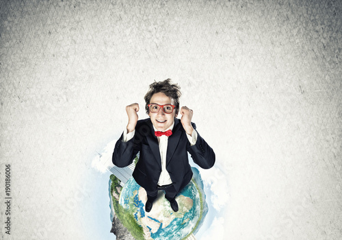 Businessman on Earth globe