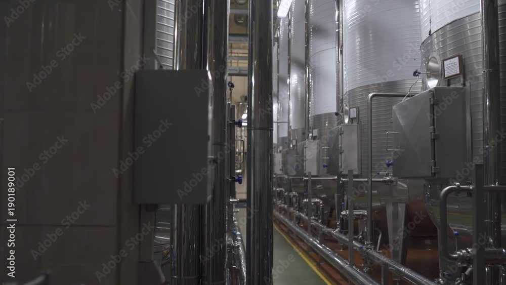 Factory of sparkling wines, view of tanks and storage of sparkling wine, production of champagne.
Factory of sparkling wines, view of tanks and storage of sparkling wine, production of champagne.