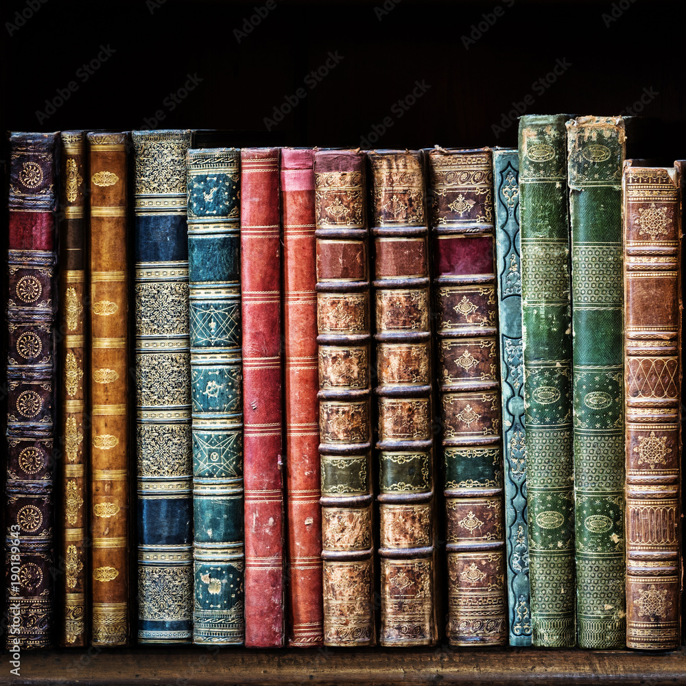 Old books on wooden shelf. Tiled Bookshelf background. Old books on wooden shelf. Tiled Bookshelf background.