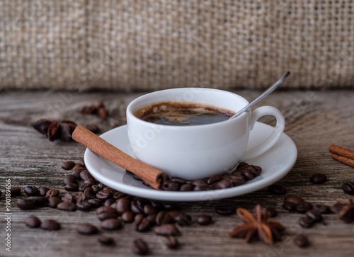 black coffee with white Cup on wooden table