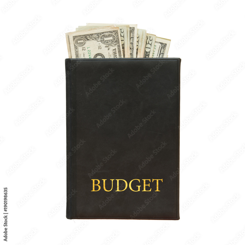 Black book with money and the inscription budget on white background Black book with money and the inscription budget on white background