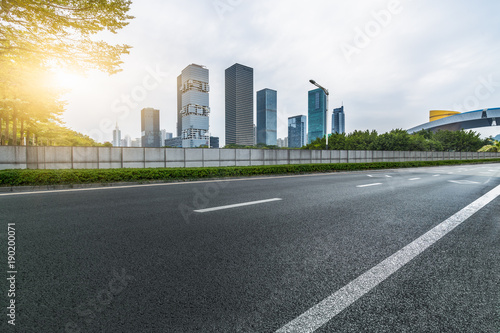 empty asphalt road with city skyline background in china.