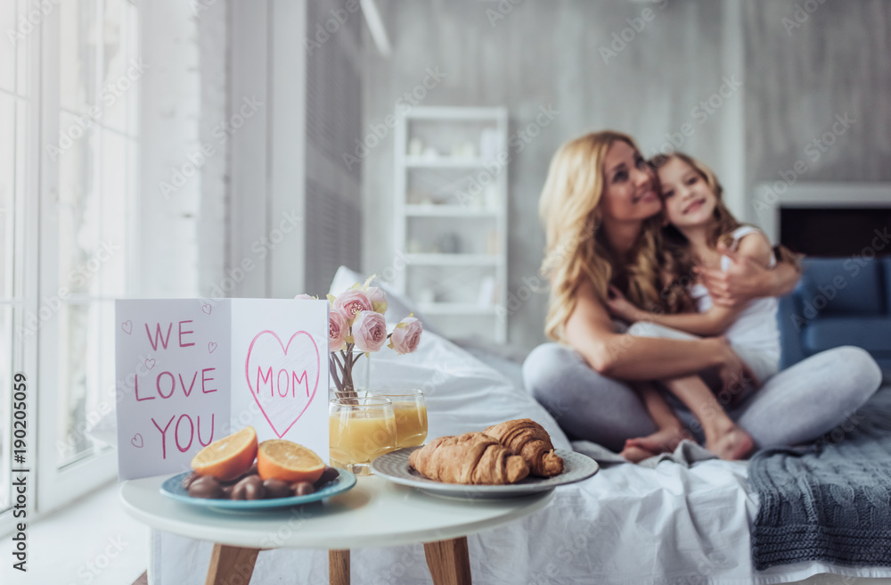 Mom and daughter at home